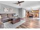Open floor plan of living room and kitchen with updated plank flooring at 6620 Avalon Blvd, Avon, IN 46123