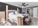 Cozy primary bedroom with decorative ceiling fan and elegant furnishings at 6620 Avalon Blvd, Avon, IN 46123