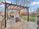 A covered pergola provides a shady spot for outdoor dining and entertaining at 6620 Avalon Blvd, Avon, IN 46123