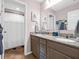 Bathroom features a double sink vanity with granite countertop and tile flooring at 6915 Diamondleaf Way, Brownsburg, IN 46112