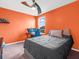 Unique bedroom features an accent wall, neutral carpet, and great natural light at 6915 Diamondleaf Way, Brownsburg, IN 46112