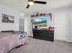 Comfortable bedroom with ceiling fan, natural light and modern decor at 6915 Diamondleaf Way, Brownsburg, IN 46112