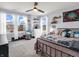 Charming bedroom featuring large windows and eclectic decor at 6915 Diamondleaf Way, Brownsburg, IN 46112