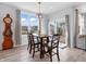 Cozy dining area featuring table with seating and large windows for ample natural light at 6915 Diamondleaf Way, Brownsburg, IN 46112