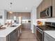 Well-equipped kitchen with stainless steel appliances and ample counter space at 6915 Diamondleaf Way, Brownsburg, IN 46112