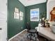 This office space has a beautiful accent wall, great natural light, and modern decor at 6915 Diamondleaf Way, Brownsburg, IN 46112