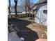 View of the backyard with grass and shed at 710 E 6Th St, Anderson, IN 46012