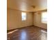 Bedroom with hardwood flooring and neutral paint at 710 E 6Th St, Anderson, IN 46012