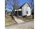 Quaint two-story home with a ramp leading to the front door at 710 E 6Th St, Anderson, IN 46012