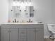 Bathroom with double sink vanity, modern fixtures, and a clean, contemporary design at 721 E Morris St, Indianapolis, IN 46203