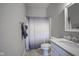 Bathroom with a shower, toilet, and vanity featuring a marble countertop at 7228 Broadacre Ct, Carmel, IN 46033