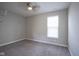 Bedroom featuring a ceiling fan and a window with blinds at 7228 Broadacre Ct, Carmel, IN 46033