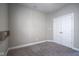 Bedroom featuring a simple shelf and a closet with white bi-fold doors at 7228 Broadacre Ct, Carmel, IN 46033