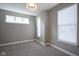 Comfortable bonus room featuring multiple windows and neutral-colored walls at 7228 Broadacre Ct, Carmel, IN 46033