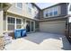 Residential home exterior with a spacious backyard, a two-car garage, with an ample parking area, and lots of natural light at 7228 Broadacre Ct, Carmel, IN 46033