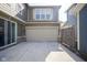 Exterior view of a two-car garage showing the driveway and backyard area of the residence with ample parking at 7228 Broadacre Ct, Carmel, IN 46033
