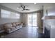 Bright living room features fireplace and sliding doors to the outdoors at 7228 Broadacre Ct, Carmel, IN 46033