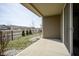 Covered patio area offering outdoor space for relaxation and enjoying the neighborhood view at 7228 Broadacre Ct, Carmel, IN 46033