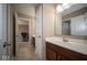 The bathroom features a modern vanity, ample counter space, and a stylish mirror for a refreshed routine at 7239 Bellini Ln, Indianapolis, IN 46259