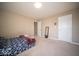 A functional bedroom features plush carpet, natural light, and plenty of space for personalization and comfort at 7239 Bellini Ln, Indianapolis, IN 46259