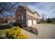 Spacious three-car garage and driveway, complemented by well-maintained landscaping at 7239 Bellini Ln, Indianapolis, IN 46259