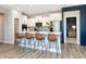 Bright and airy kitchen with a center island, stainless steel appliances, and bar seating at 7572 Bluegill Dr, Noblesville, IN 46062