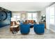 Spacious living room boasts modern decor, comfortable seating, and views of the surrounding neighborhood at 7572 Bluegill Dr, Noblesville, IN 46062