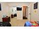 Bedroom featuring a mounted TV and closet with sliding mirror door at 8172 Shottery Ter, Indianapolis, IN 46268