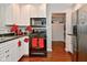 Modern kitchen featuring black appliances, white cabinets, and a functional layout at 8172 Shottery Ter, Indianapolis, IN 46268