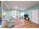 Finished basement with entertainment area and access to the outdoor deck at 8205 Bass Dr, Nineveh, IN 46164