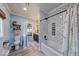 Well-designed bathroom features a tiled shower/tub, dual vanity, and ample natural light at 8205 Bass Dr, Nineveh, IN 46164