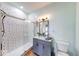 Updated bathroom with glass shower, subway tile, and sleek vanity at 8205 Bass Dr, Nineveh, IN 46164