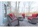 Covered deck area perfect for entertaining with comfortable seating and a heater at 8205 Bass Dr, Nineveh, IN 46164