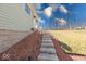 A stone staircase with landscape lighting leading up to the home at 8205 Bass Dr, Nineveh, IN 46164