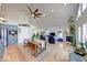 Spacious living area with hardwood floors, open floorplan and seamless access to the kitchen at 8205 Bass Dr, Nineveh, IN 46164