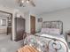 Bedroom with metal frame bed, soft carpet, and neutral paint, creating a relaxing atmosphere at 8460 S Green Dr, Nineveh, IN 46164