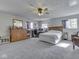 Large bedroom featuring gray carpet, neutral walls, and generous natural light for a serene retreat at 8460 S Green Dr, Nineveh, IN 46164