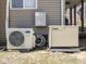 Exterior shot of a Kohler power generator system and AC unit installed on a home's exterior at 8460 S Green Dr, Nineveh, IN 46164