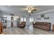 Spacious living room with modern flooring, neutral colors, and comfortable seating at 8460 S Green Dr, Nineveh, IN 46164