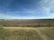 View of a large fenced in backyard with scenic background and ample space at 8626 Jeff Cir, Brownsburg, IN 46112