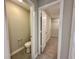 Bathroom featuring a toilet and view to a closet at 8626 Jeff Cir, Brownsburg, IN 46112
