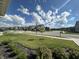 Neighborhood street view showcasing well-maintained homes and landscaping on a sunny day at 8626 Jeff Cir, Brownsburg, IN 46112