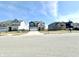 Charming neighborhood street featuring well-maintained homes and manicured lawns at 8626 Jeff Cir, Brownsburg, IN 46112