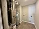 Utility room with modern tile flooring and gray walls at 8626 Jeff Cir, Brownsburg, IN 46112
