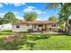 Outdoor patio area, perfect for entertaining, with ample seating and a grill at 8715 Legion Ln, Indianapolis, IN 46231