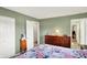 Bedroom featuring neutral walls, carpet flooring, and several storage cabinets at 8715 Legion Ln, Indianapolis, IN 46231