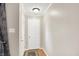 Bright foyer with hardwood floors, neutral paint, and simple decor at 8715 Legion Ln, Indianapolis, IN 46231