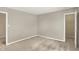 Neutral bedroom with two doorways and neutral carpet at 9243 Crossing Dr, Fishers, IN 46037
