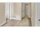 Neutral bedroom features multiple doorways, neutral carpet, and clean trim at 9243 Crossing Dr, Fishers, IN 46037