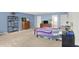 Spacious bedroom featuring modern decor, ample storage, and lots of natural light at 9243 Crossing Dr, Fishers, IN 46037